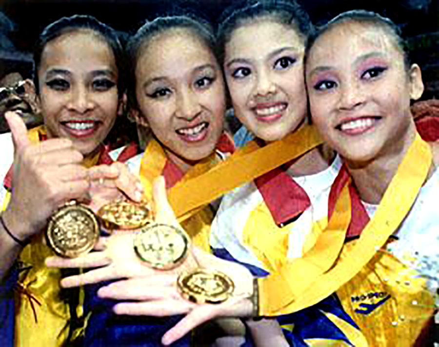Utusan Online Showing off the gold.